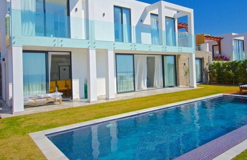 Gundogan Villa | Luxurious seafront Mediterranean villa with private pool