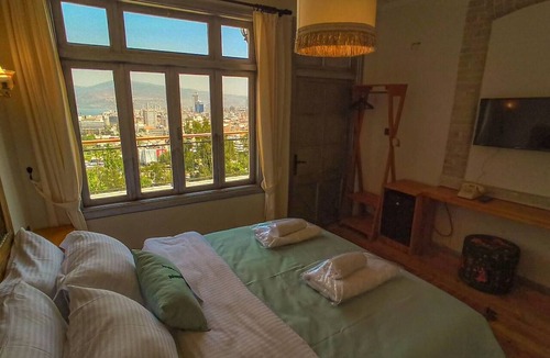 Konak House | 1901 CLOCK TOWER ROOM – Spacious, Bright, and Comfortable with Unobstructed Ocea