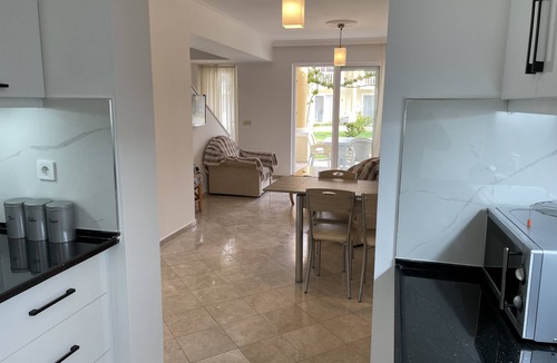 Fethiye City Center Villa | 3 bedroom beach front holiday home with shared pool and seaviews