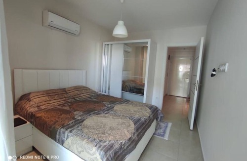 Avsallar Apartment | Akdeniz kıyısına çok yakın.Muhteşem kumsalında deniz ve havuzun keyfini çıkarın.