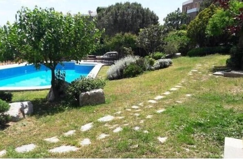 Dagbelen House | Amazing panoramic sea view, stone house garden floor with community pool