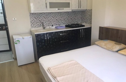 Ezine Apartment | Asya Geyikli Apart Otel