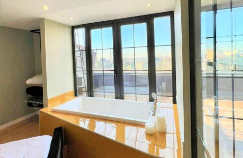 Gumussuyu Mahallesi Apartment | Charming, Designer Apartment with Private Rooftop Terrace, Bathtub, and Sea View in Taksim