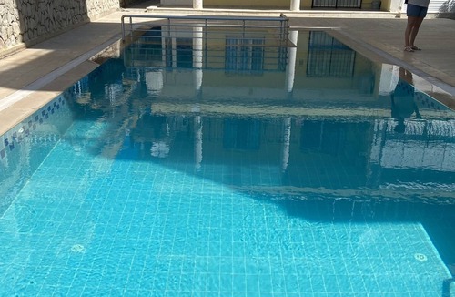 Altinkum Apartment | Lovely ground floor apartment next to communal pool.10 minutes walk to the beach