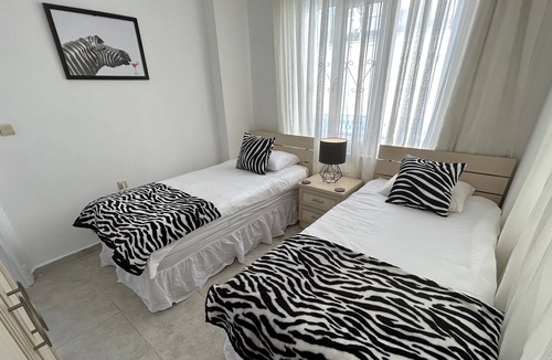 Altinkum Apartment | Lovely ground floor apartment next to communal pool.10 minutes walk to the beach