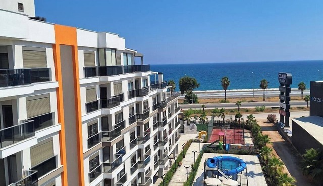 Cozy 2-bedroom apartment in Finike with a sea view, pool, sauna and gym