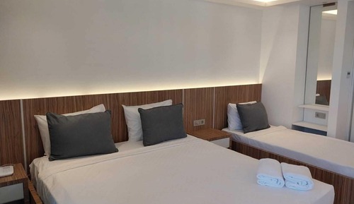 Deluxe Triple Room, Multiple Beds