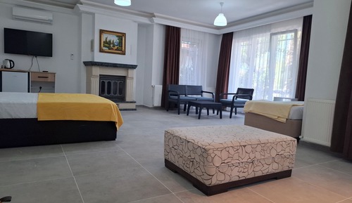 Deluxe Quadruple Room, Balcony, Garden View
