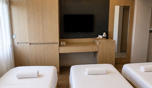 Deluxe Triple Room, Balcony, Partial Sea View