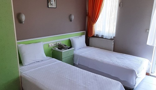 Standard Triple Room, Balcony, Garden View