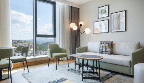 Deluxe King Room with Sofa Bed and City View