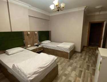 Single Bed in Dormitory Room