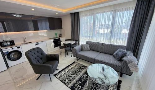 One-Bedroom Apartment with Balcony and Sea View