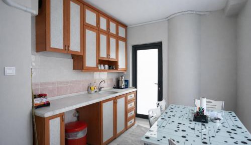 One-Bedroom Apartment with Balcony and City View