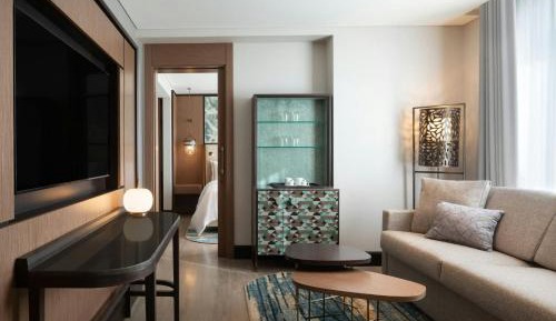 Premium King Suite with Sofa Bed, Balcony and City View