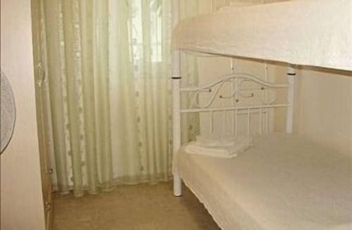 Fethiye City Center Apartment | Ground Floor Apartment With Shared Pool And Gardens