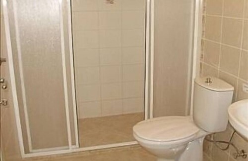 Fethiye City Center Apartment | Ground Floor Apartment With Shared Pool And Gardens
