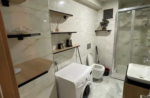 Esenyurt House | Apartment room and salon within a block with a pool and gym