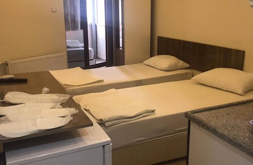 Ezine Apartment | Asya Geyikli Apart Otel