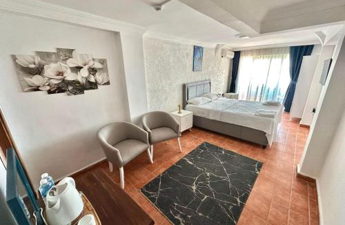 Kucukkuyu Hotel | Deniz Kenarı Beach & Garden