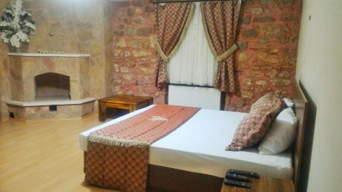 Ezine Hotel | Odunluk Tas Konak Hotel