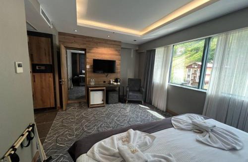 Caykara Hotel | Mayben Otel