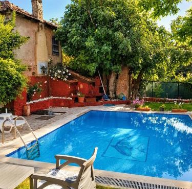 Stone mansion with private pool and garden and authentic village house